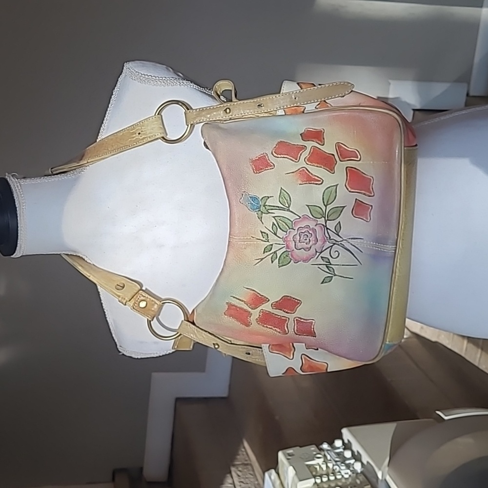 100 % genuine leather handpainted shoulder purse.